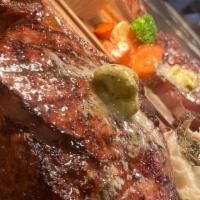 Bone-In Ribeye (22 Oz) · Served with whipped potatoes, seasonal vegetables and zip sauce.
*Consuming raw or undercook...