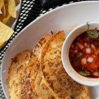 Carnitas Tacos · Three sautéed pork tips tacos. Cilantro | onions | rice or refried beans.
