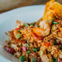 Cajun Jambalaya · Shrimp, Chicken, Andouille Sausage, Red & Green Peppers, Rice and Grilled Corn Bread