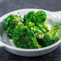 Steamed Broccoli  · Gluten friendly. Tossed in Roasted Garlic Butter