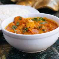 Chicken Curry · Chicken cooked in a light gravy with freshly ground spices.