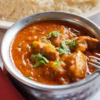 Lamb Tikka Masala · Lamb cubes cooked with fresh onion, bell pepper, and light gravy.