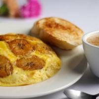 Nellie'S Breakfast Special · Tortilla Boricua, an open faced-omelet seasoned with sofrito, mozzarella cheese, tomatoes, g...