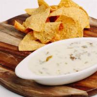 Small Meaty Queso · Queso plus your choice of meaty filling. *Gluten free