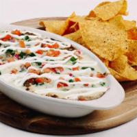 Small Nacho · Your choice of meat, refried beans, black beans, monterey jack cheese, Yabo’s queso, pico de...