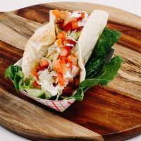 Chicken Bacon Ranch Taco · Grilled chicken served with crispy bacon, shredded lettuce, diced tomatoes and topped with b...