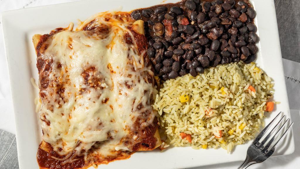 Chicken Enchilada  · Chihuahua cheese, guajillo mole, served with rice & beans.