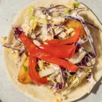 Sconnie Rojo Taco  · Dos equis battered cod, red jalapeno slaw, pickled red pepper.