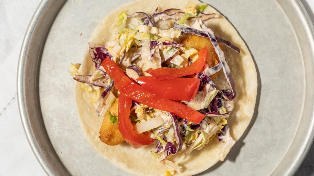 Sconnie Rojo Taco  · Dos equis battered cod, red jalapeno slaw, pickled red pepper.