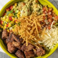 Taco Salad  · lettuce, guacamole, pico de gallo, black bean corn salsa, chihuahua cheese, tortilla strips,...