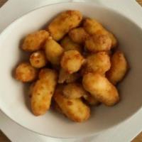 Ellsworth Wi Cheese Curds · Beer-battered and served with spicy jam
