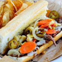 Short Rib Cheesesteak · Shaved short rib and provolone cheese served on a sourdough baguette with a side of au jus. ...