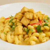 Vegan Tofu Mac & Cheese · Vegan cheese sauce and roasted bell peppers served with Tofu, garnished with basil