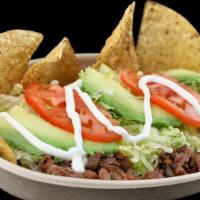 Burrito Belly Bowl · Meat of choice and chips on the side served with beans, rice, sour cream, avocado, lettuce, ...