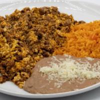 Huevos Con Chorizo ( Chorizo & Eggs) · Served with rice, beans, and 6 tortillas.