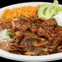 Bistec À La Mexicana · Chopped flank steak tomato, onion, jalapeño and salsa. Served with rice, beans, salad and 6 ...