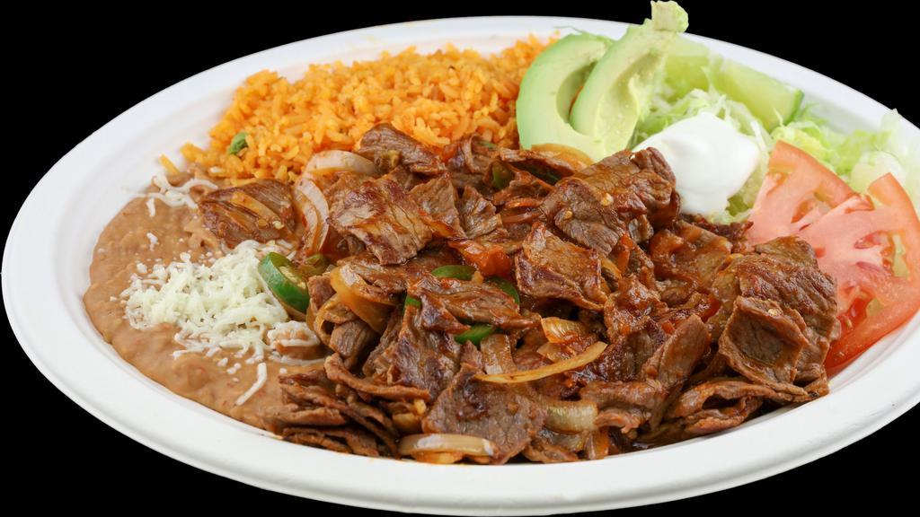 Bistec À La Mexicana · Chopped flank steak tomato, onion, jalapeño and salsa. Served with rice, beans, salad and 6 tortillas.
