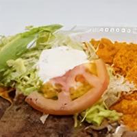 Breaded Chicken (Milanesa De Pollo) · Served with rice, beans, salad and 6 tortillas.