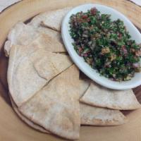 Side Of Tabouli · Feeds 2 people. Comes with a bag of pita chips.