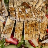 Strawberry Chicken Salad · Mixed greens, grilled chicken breast, strawberries, pineapple, cucumbers and walnuts.
