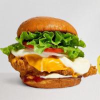 Cheesy Mood Chicken Sandwich · Crispy fried chicken, melted cheese, lettuce, tomato, onion, house mayo, and ketchup. Served...