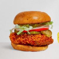Some Spice Chicken Sandwich · Crispy fried chicken, sliced tomatoes, shredded lettuce, jalapenos, and hot sauce. Served on...
