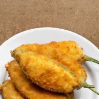 Jalapeno Poppers  · Crispy jalapeno poppers filled with gooey cheddar cheese are fried to perfection till golden...