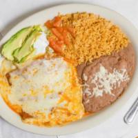 Beef Enchiladas Suizas Dinner · Served with rice and beans.