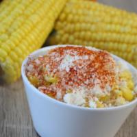 Mexican Street Corn · Corn, Mayo, Butter, Cotija Cheese, Chili Pepper.