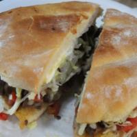 Tortas · Served with beans, lettuce, tomato, cheese and sour cream.