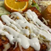 Enchiladas (3) · 3 enchiladas served with beans, rice, salad and topped with sour cream and cheese.