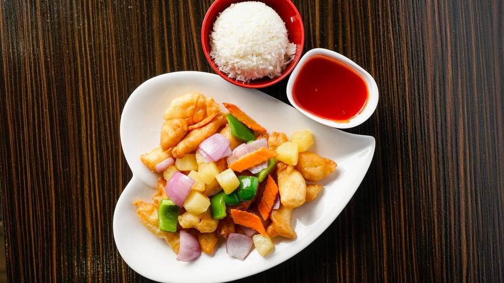 Sweet & Sour Chicken · Green pepper, carrots, onions and pineapple with sweet sour sauce on the side.