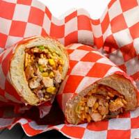 Pepitos Falcon · Bread, lettuce, tomato, chips, bacon, sauces, parmesan cheese, and corn.