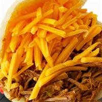 Pelua · Shredded beef, cheddar cheese, sauces.