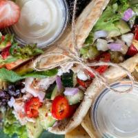 Turkey Feta Wrap · Peppered turkey, Cucumber, Tomatoes, Red Onions, Sweet Peppers, Vinaigrette, Spring mix, Fet...