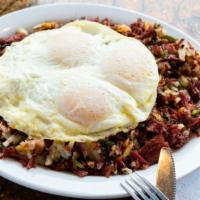 Corned Beef Hash · Our famous corned beef hash, served with choice of  eggs & toast
