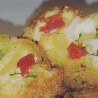 Golden Nuggets · 5 deep fried bites (cream cheese or philly).