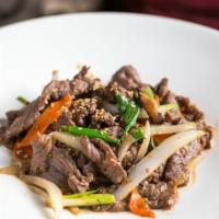Bulgogi · Thinly sliced ribeye beef, mild soy sauce, onions, shitake mushrooms, carrots, scallions.