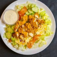 Chicken Tender Salad · Lettuce, crispy chicken, cheese, tomato, bacon, croutons, cucumbers, carrot.