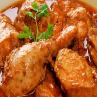 Chicken Korma · A Famous North Indian style chicken cooked with middle spicy cashew & Cream sauce gravy