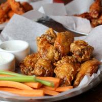 Chicken Wings (Bone-In) · Barbeque, spicy buffalo or honey sriracha, served with carrots, celery, your choice of blue ...
