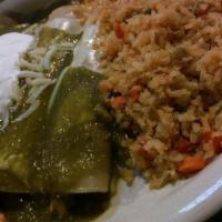 Enchilada Suizas · A top pick for all our delicious dishes! Four fresh corn tortillas filled with marinated chi...