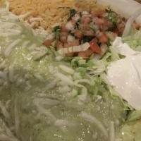 Cilantro Burrito · Filled with steak or grilled chicken, beans . Topped with cilantro sauce. Offered with Mexic...