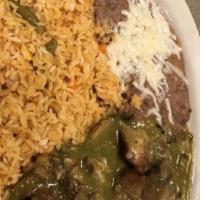 Chile Verde · Pork carnitas sauteed in onion and tomatillo sauce. Served with rice and beans.