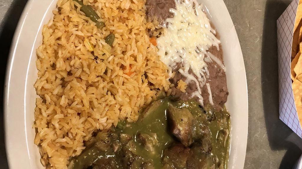 Chile Verde · Pork carnitas sauteed in onion and tomatillo sauce. Served with rice and beans.