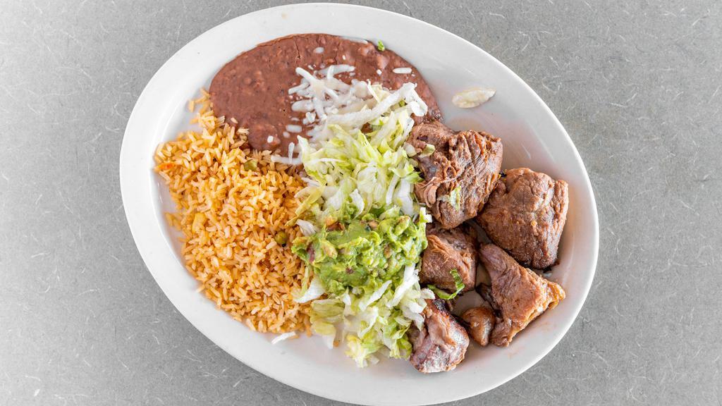 Carnitas · A Chile Verde favorite! Seasoned pork tips deep-fried crisp and offered with lettuce, guacamole, rice and beans.