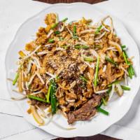 Stir Fried Noodles With Beef · Green onion. white onion, bean sprouts. and beef stir fried with rice noodles in soy sauce.