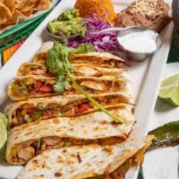 Chicken Fajitas Quesadilla · Grilled onions, red, yellow and green peppers.