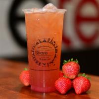 Strawberry Green Tea · Our signature Green Tea is mixed with a Strawberry syrup to give it a more refreshing taste.