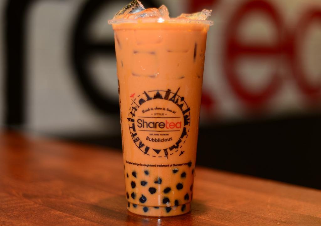 Thai Pearl Milk Tea  · Ice cold with a creamy taste added by a bit of black tea flavor. The main ingredient is Thai tea powder with boba pearls, this sweet milky drink is refreshing.